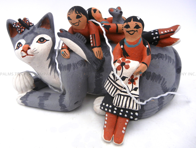 Jemez cat figurine with three children, fish, mouse, butterfly and ball of yarn by Carol Lucero Gachupin