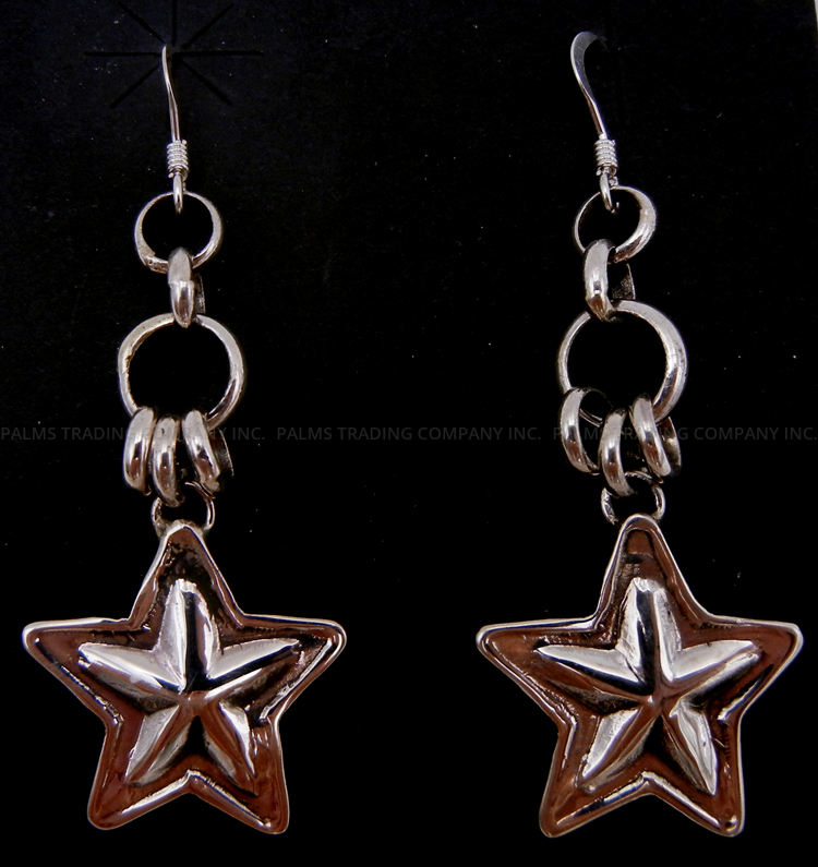 Navajo sterling silver repousse star dangle earrings by Dakota Willie
