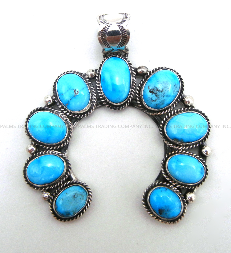 Navajo turquoise and sterling silver naja pendant by Will Denetdale